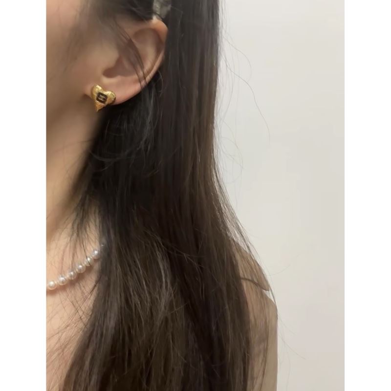 ch**an D*or earrings